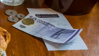 50 DKK and coins with a hole, Copenhagen, Denmark